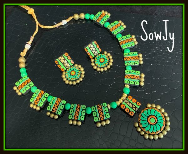 Very Grand Designer Terracotta Chakra Choker Set with Designer Earrings in Shades of Light and Dark Green with Orange Highlights!!!