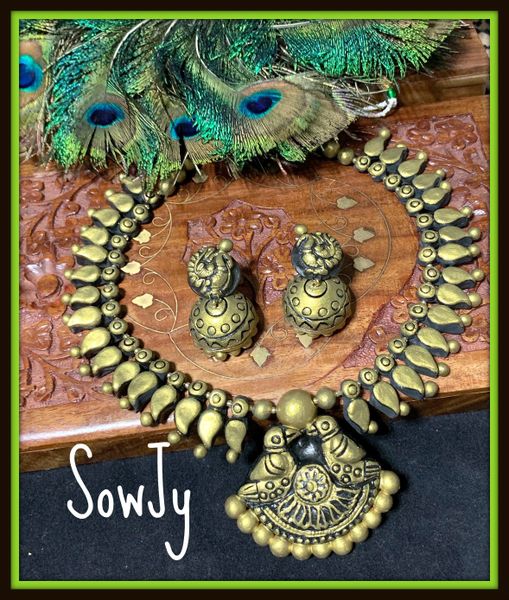 Lovely Dual Birds pendant Grand terracotta Haaram with Mango Beads and Matching Large Sized Jhumkas in Shades of Antique Gold!!!!