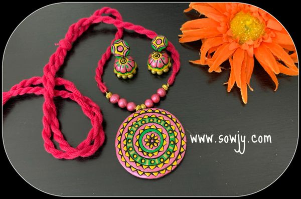 Trendy Circle Designer Pendant in shades of Pink, yellow and Green and Earrings with Jhumkas in Pink Long Rope!!!!