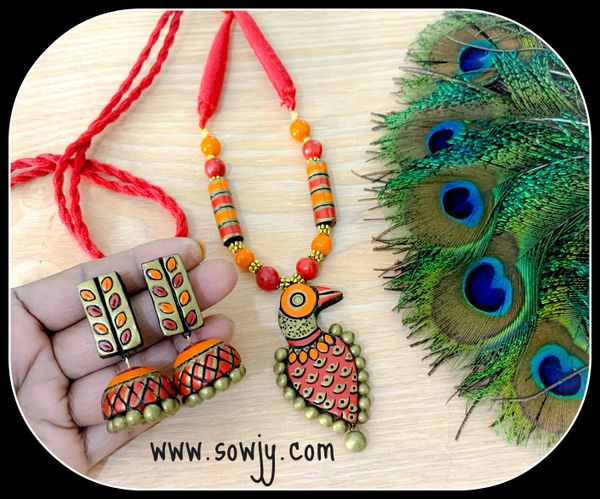 Lovely Peacock Terracotta Pendant with Long Studded leaf Jhumkas- Shades of Orange,Red and Gold!!!