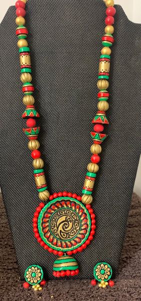 Lovely Peacock Terracotta Pendant Long Haaram with Designer Beads and Designer Studs!!!