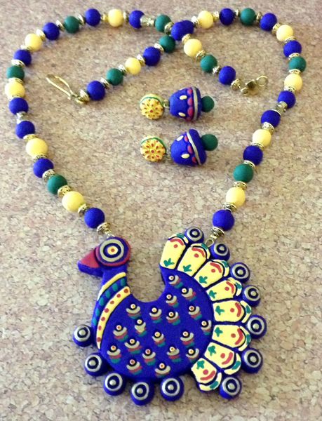 Blue and Yellow Peacock Pendant with matching Jhumkas!!!!