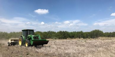 Tractor with a seeding implement